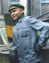 Budapest tire worker.jpg (97338 bytes)